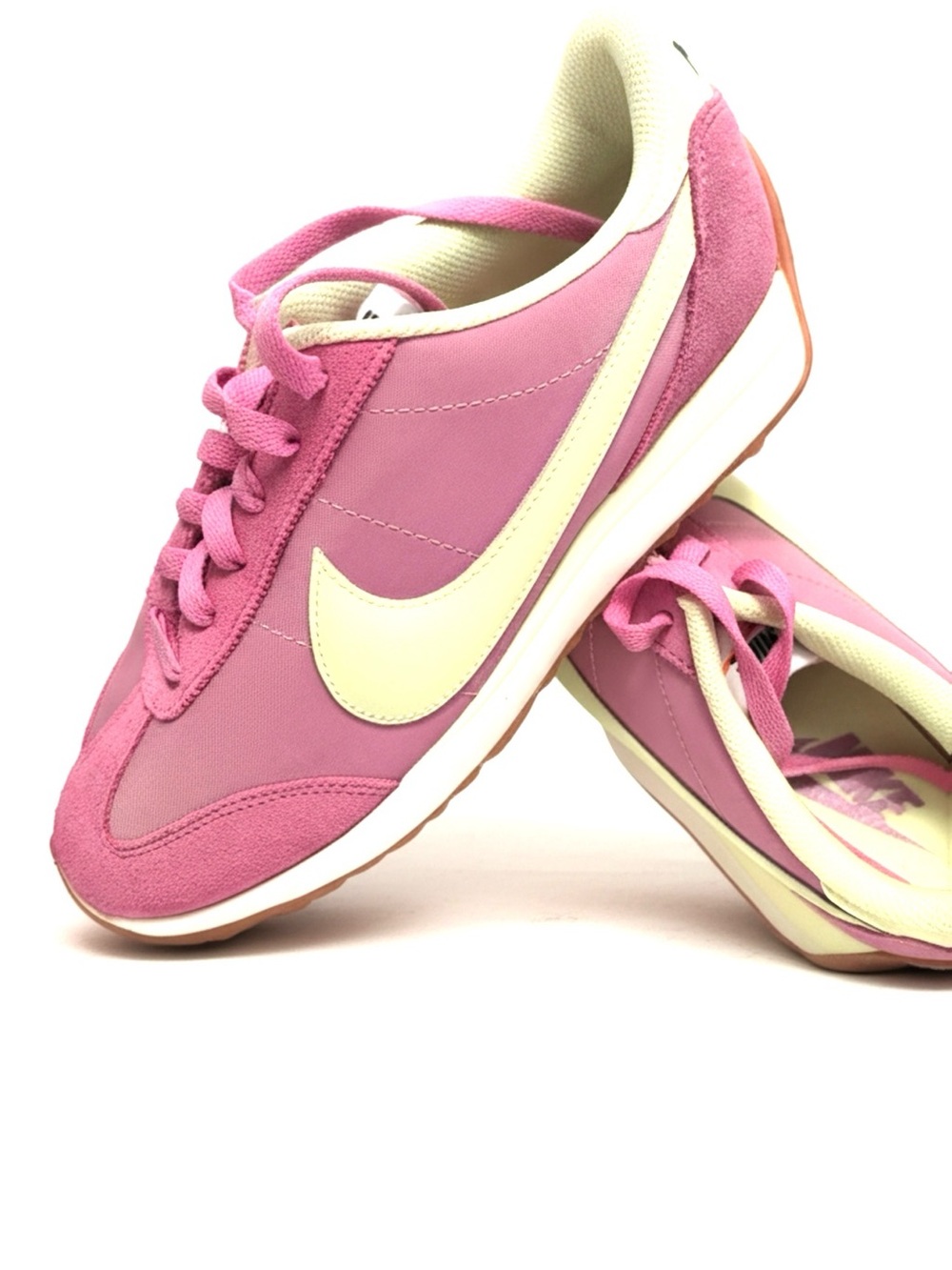 Nike women’s pink and lime, green Athletic Sneakers
